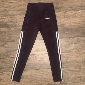 High-waisted charcoal grey Adidas tights with pockets